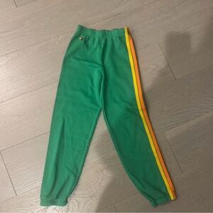 Aviator Nation Green Kids Bottoms with Yellow and Orange Stripes